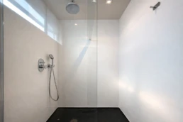 Luxury bathroom with walk-in shower at Astria Villas rental