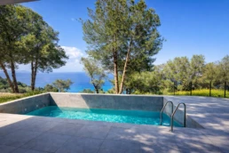 Luxury infinity pool with sea view at Astria Villas rental