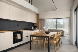 Luxury open-plan kitchen, dining and living area at Astria Villas rental