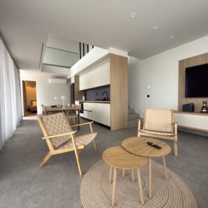 Villa 3 in Vourvourou, Halkidiki, featuring a bright bedroom with modern design and minimalist decor.